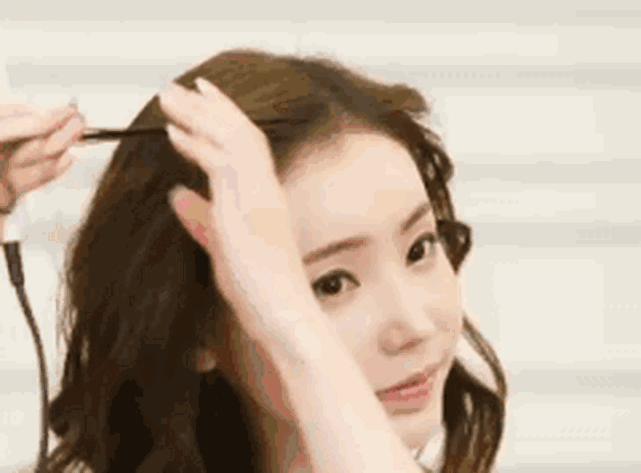 所有刘海款式中,最修饰脸型的当属龙须刘海,难怪热巴杨幂离不开